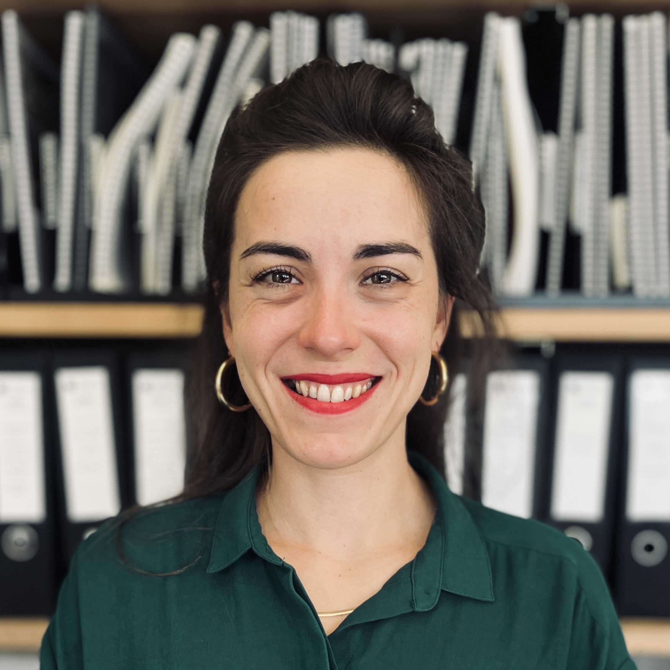 Portrait of Clelia Balland smiling wearing a green shirt